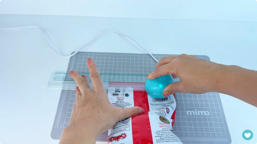 Selando pacote de alimento com a Mimo Sealing