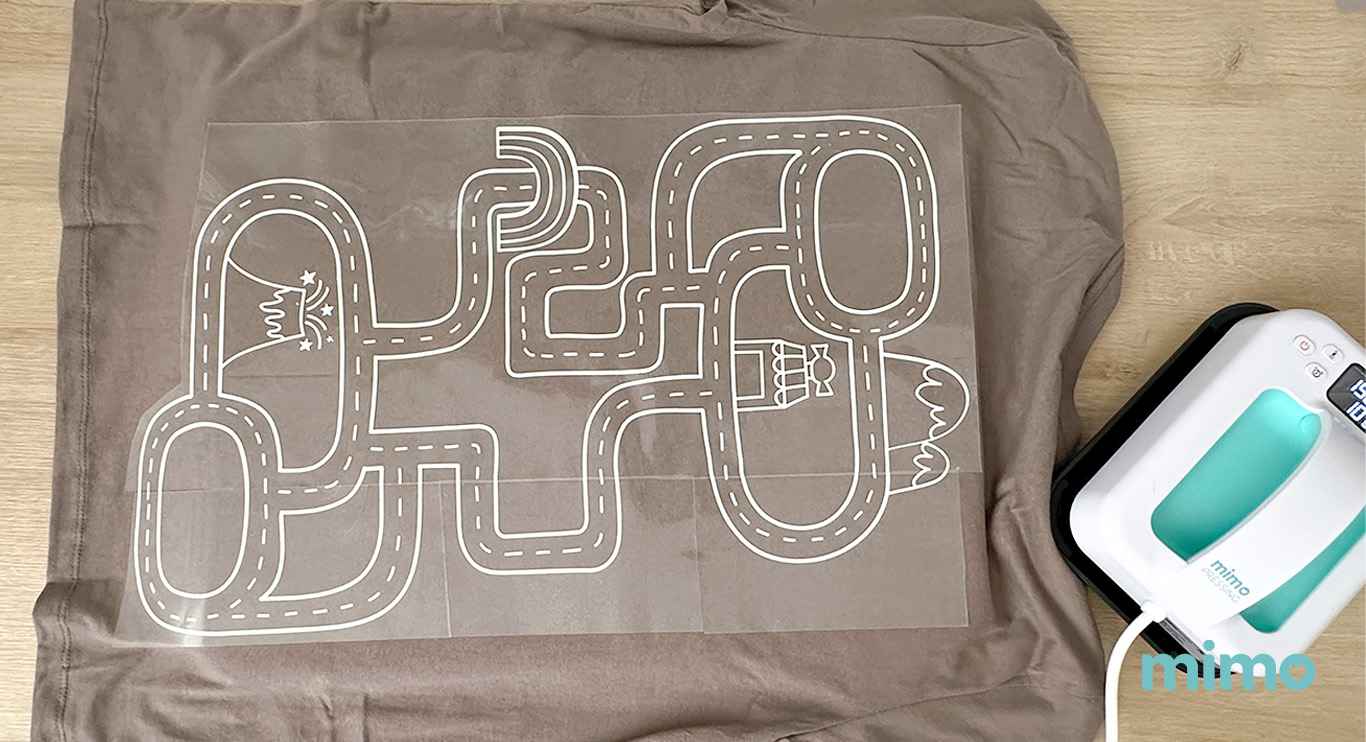 Aplicando o transfer na camisa